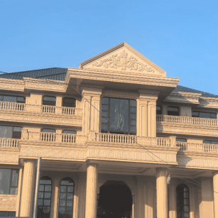 池州黄金麻别墅外墙干挂石材效果示例