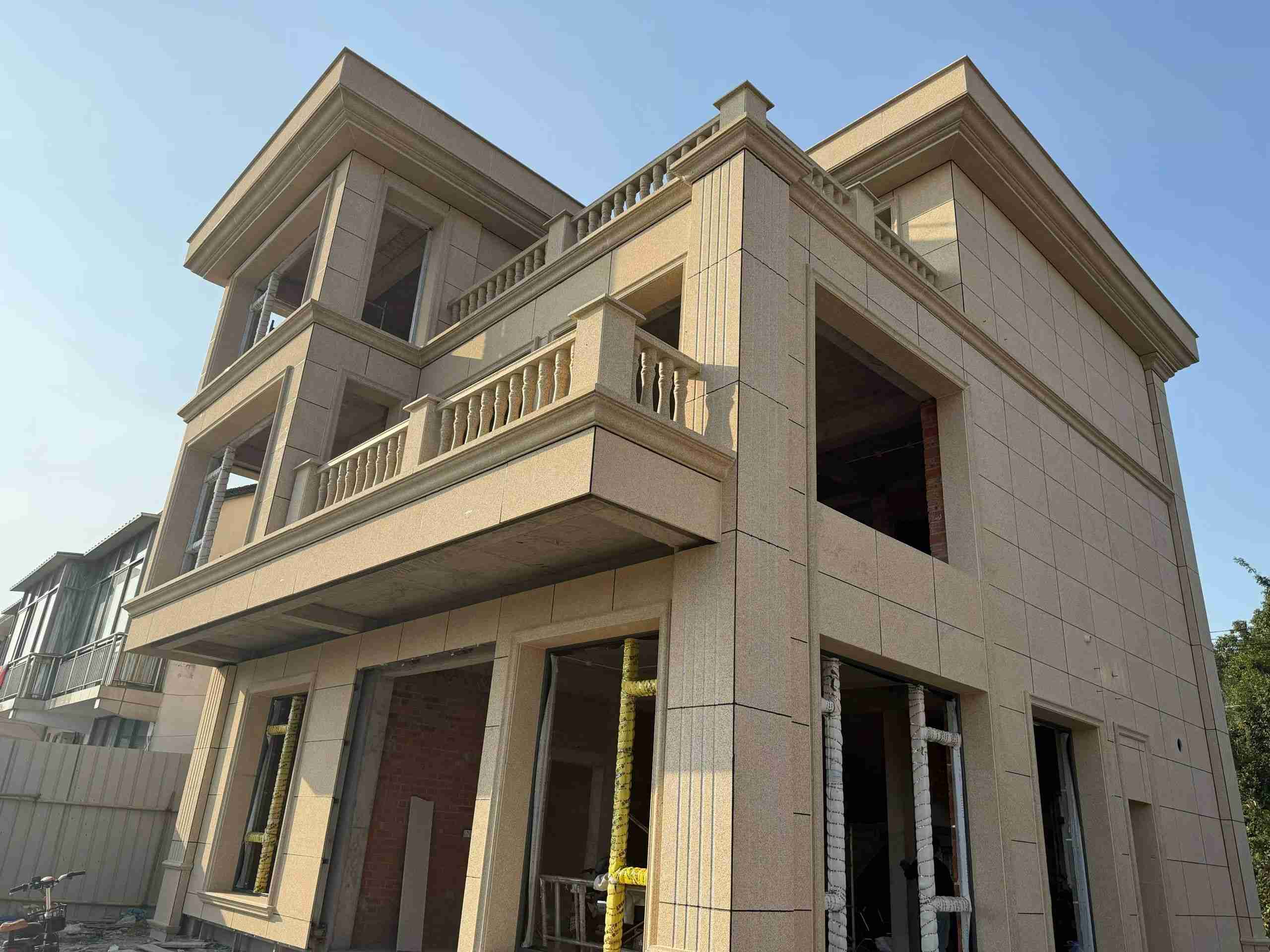 池州 黄金麻花岗岩石材荔枝面外墙干挂效果展示